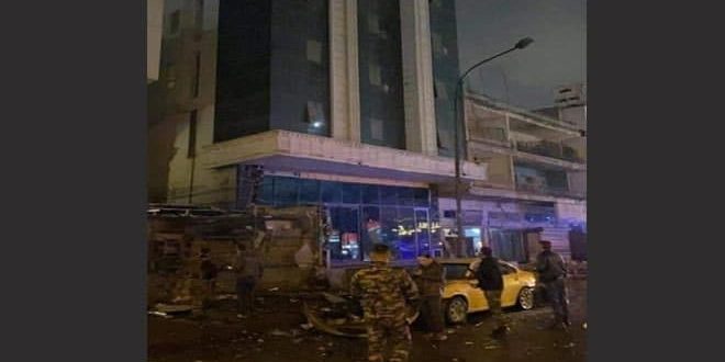 Two Iraqis wounded in blasts that targeted two banks in Baghdad
