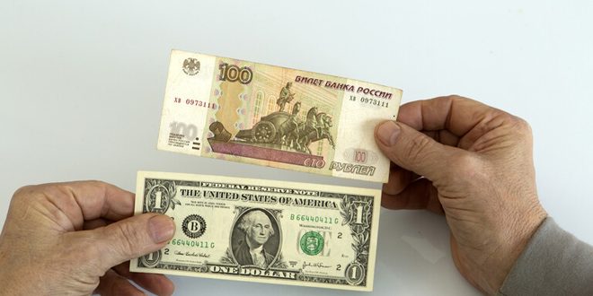 Russian ruble rises against dollar and euro