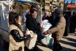 Familias desplazadas por bombardeos turcos reciben asistencia humanitaria
