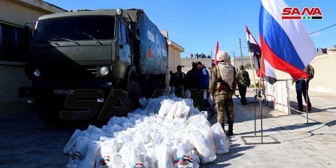 توزيع مساعدات إنسانية مقدمة من روسيا الاتحادية بريف حماة
