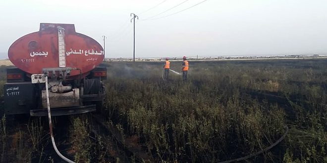إخماد حريق محاصيل زراعية بمنطقة القصير بريف حمص