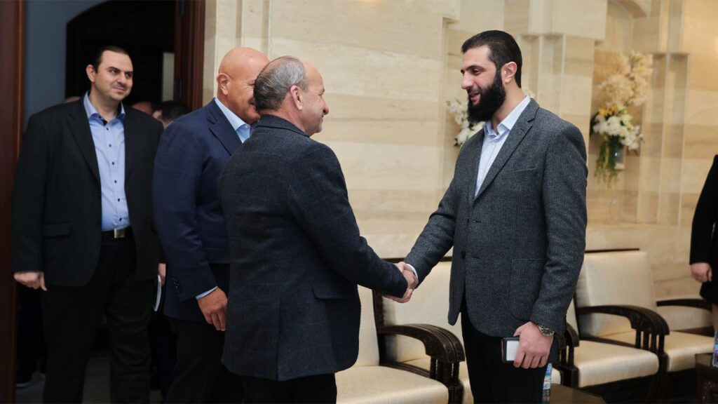Leader Al-Sharaa meets a number of businessmen in Damascus