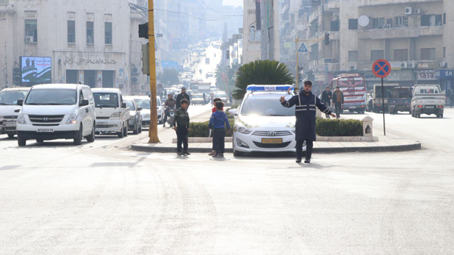 Traffic police organize traffic flow in the liberated city of Hama- photos