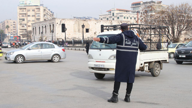 Traffic police organize traffic flow in the liberated city of Hama- photos