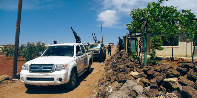Public security forces carry out a security campaign in two towns in Daraa countryside